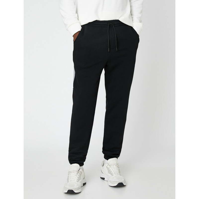 Koton Basic Trousers with a Lace-Up Waist.
