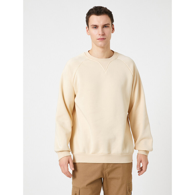 Koton Crew Neck Sweatshirt with Stitching Detail Raglan Sleeve.