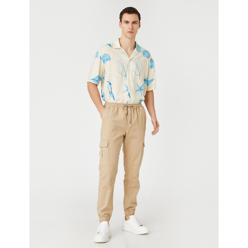 Koton Jogger Cargo Pants with Lace-Up Waist with Pocket Detail.