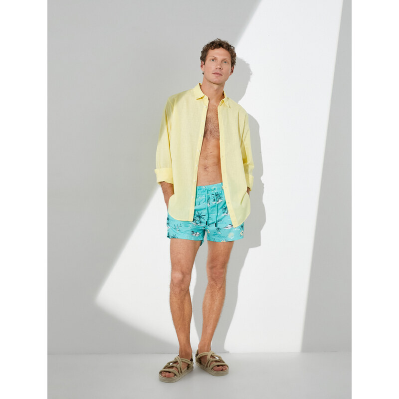 Koton Beach Shorts Summer Theme with a drawstring waist and pockets.