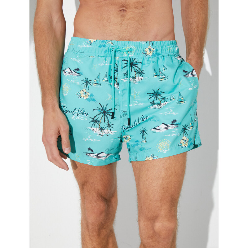 Koton Beach Shorts Summer Theme with a drawstring waist and pockets.