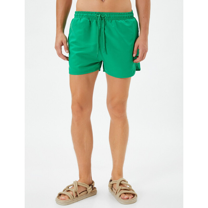 Koton Swimsuit Shorts Short waist with a tie-down pocket.