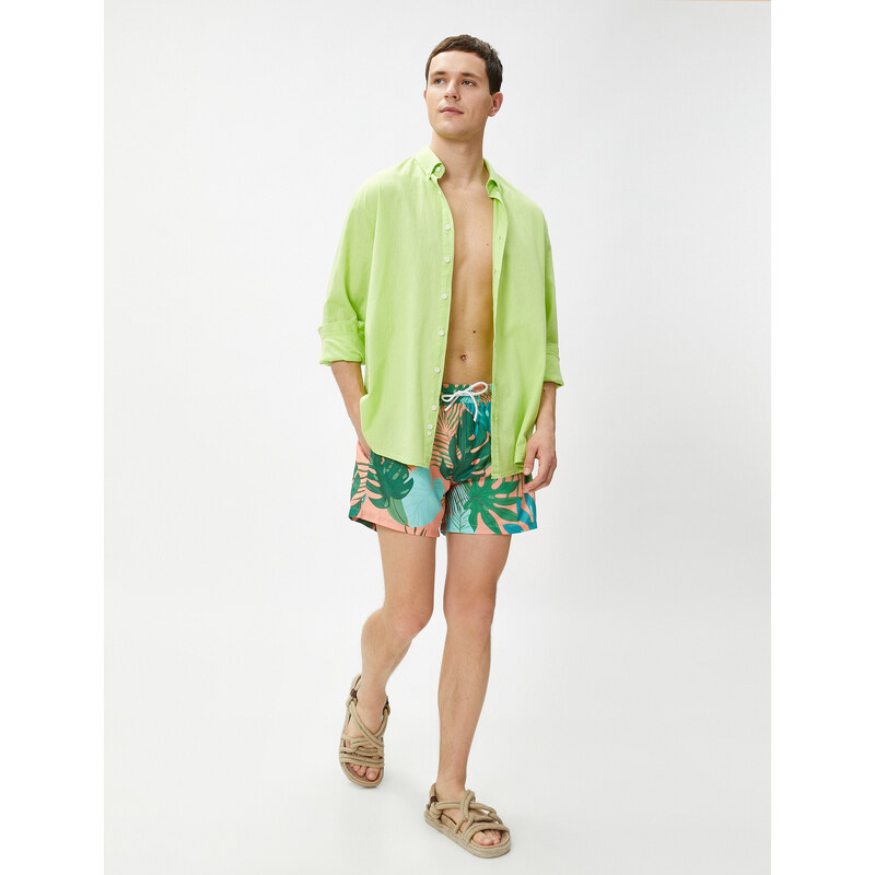 Koton Marine Shorts with a Tropical Print Tie Waist, Pocket Detailed.