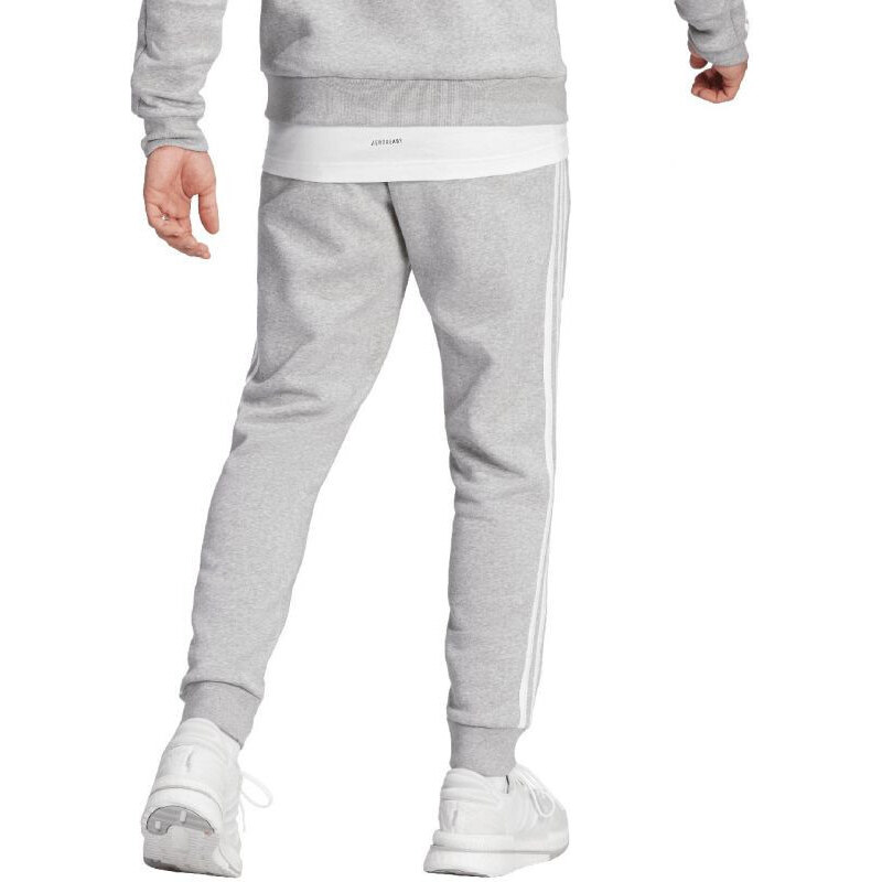 Fleecové kalhoty adidas Essentials se zúženými manžetami M IJ6494