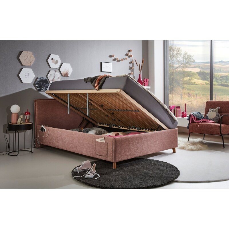 Růžová čalouněná postel Meise Möbel Fun 90 x 200 cm s úložným prostorem