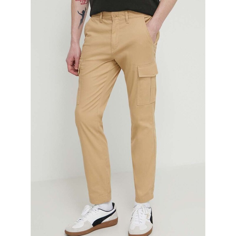 Kalhoty Tommy Jeans pánské, béžová barva, přiléhavé