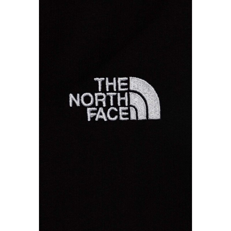 Dětské bavlněné tepláky The North Face OVERSIZED JOGGERS černá barva