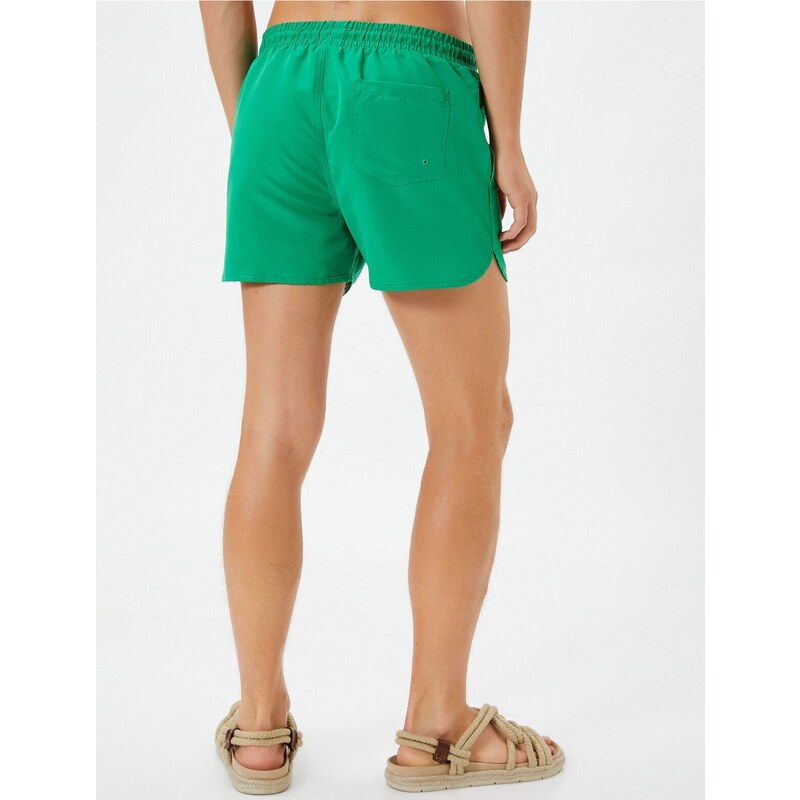 Koton Swimsuit Shorts Short waist with a tie-down pocket.