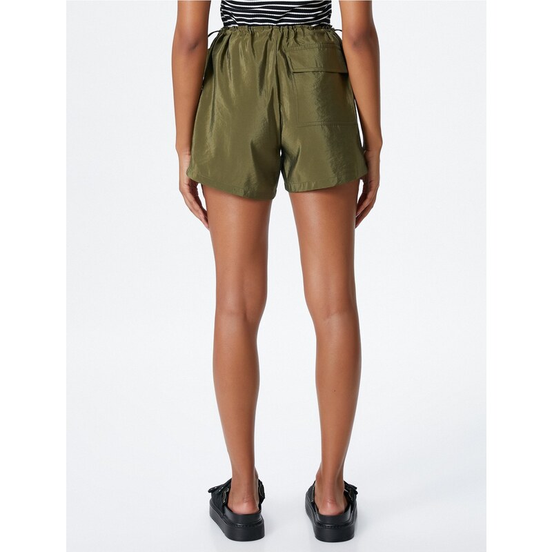 Koton Parachute Mini Shorts with smocked Waist, Stopper, Flap, and Pocket.