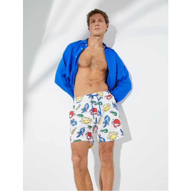 Koton Animal Printed Marine Shorts with a lace-up waist with pocket.