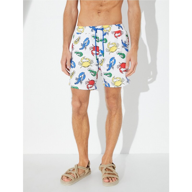 Koton Animal Printed Marine Shorts with a lace-up waist with pocket.