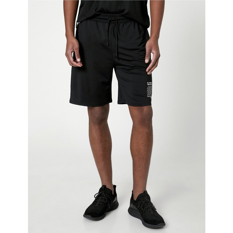 Koton Sports Shorts with Lace-Up Waist, Pocket with Slogan Print.