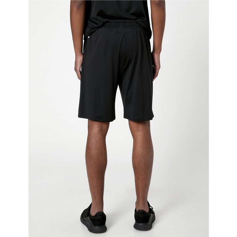 Koton Sports Shorts with Lace-Up Waist, Pocket with Slogan Print.