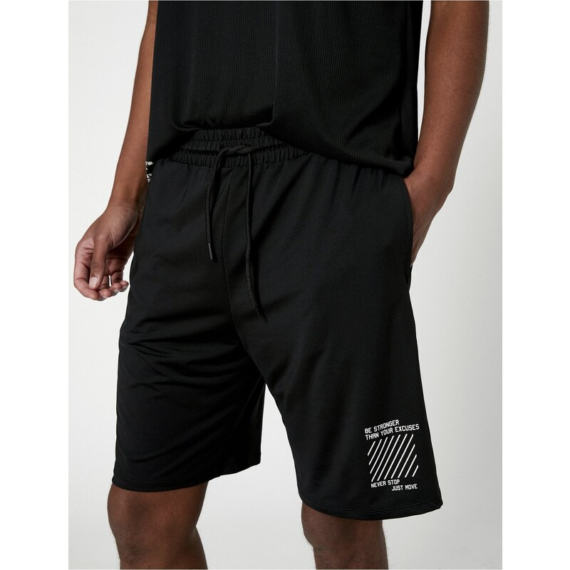 Koton Sports Shorts with Lace-Up Waist, Pocket with Slogan Print.