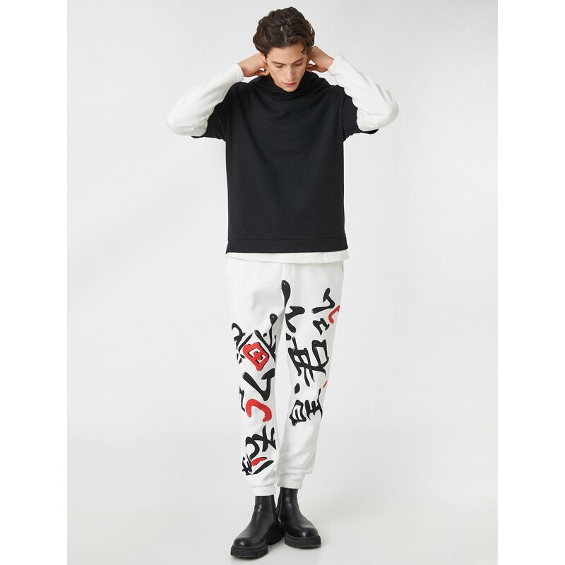 Koton Asian Print Jogger Sweatpants with a drawstring waist and pockets.