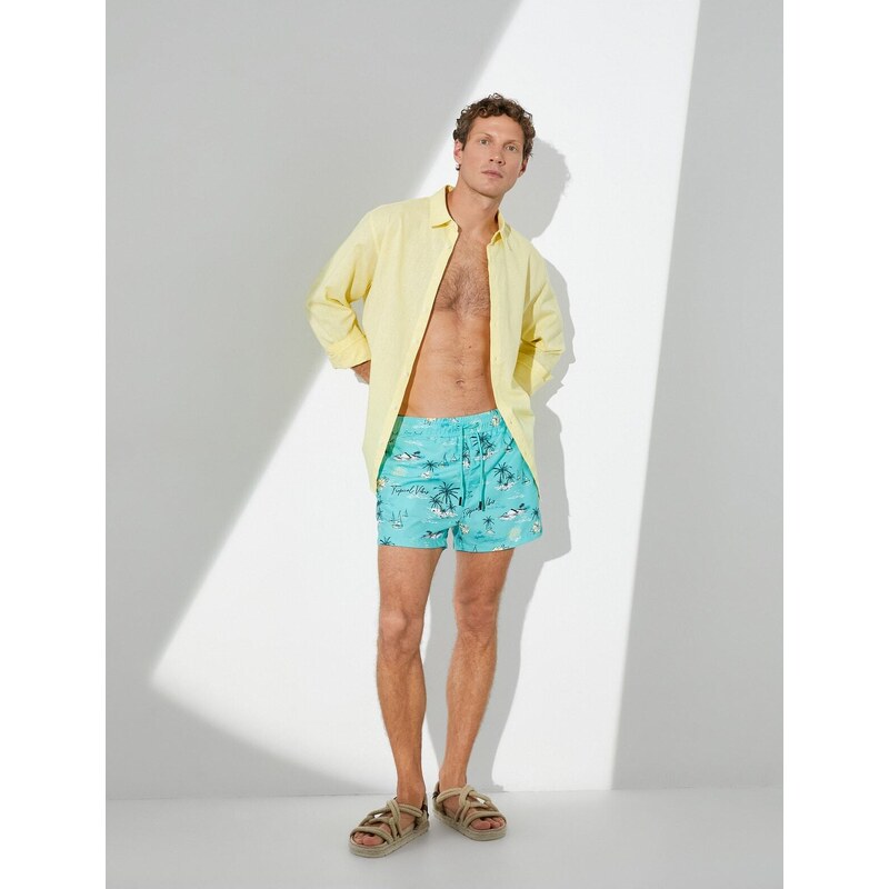 Koton Beach Shorts Summer Theme with a drawstring waist and pockets.