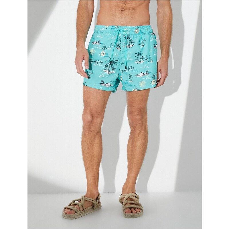 Koton Beach Shorts Summer Theme with a drawstring waist and pockets.