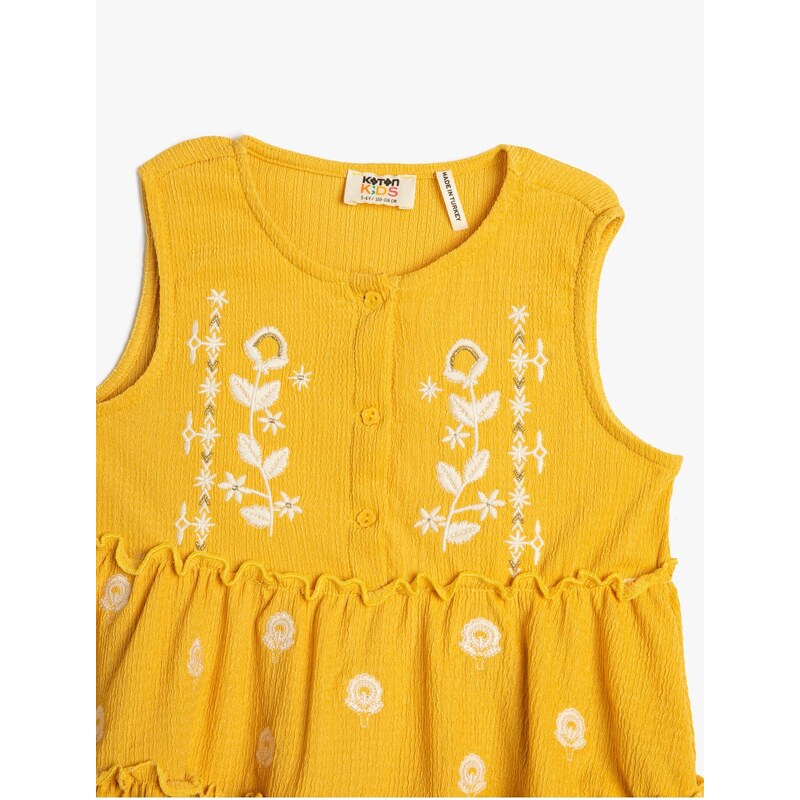 Koton Sleeveless T-Shirt with Embroidered Flowers and Ruffles in a loose fit.