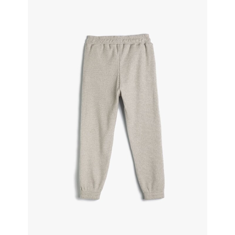 Koton Basic Jogger Trousers. Textured, elastic waist, pockets.