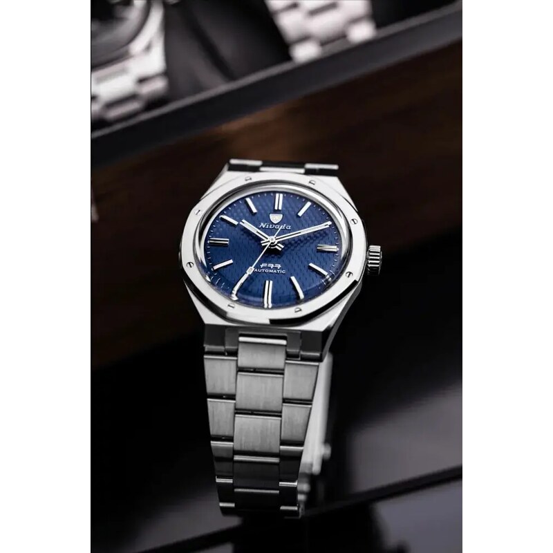 Stříbrné pánské hodinky Nivada Grenchen s ocelový páskem F77 Blue No Date 68001A77 37MM Automatic