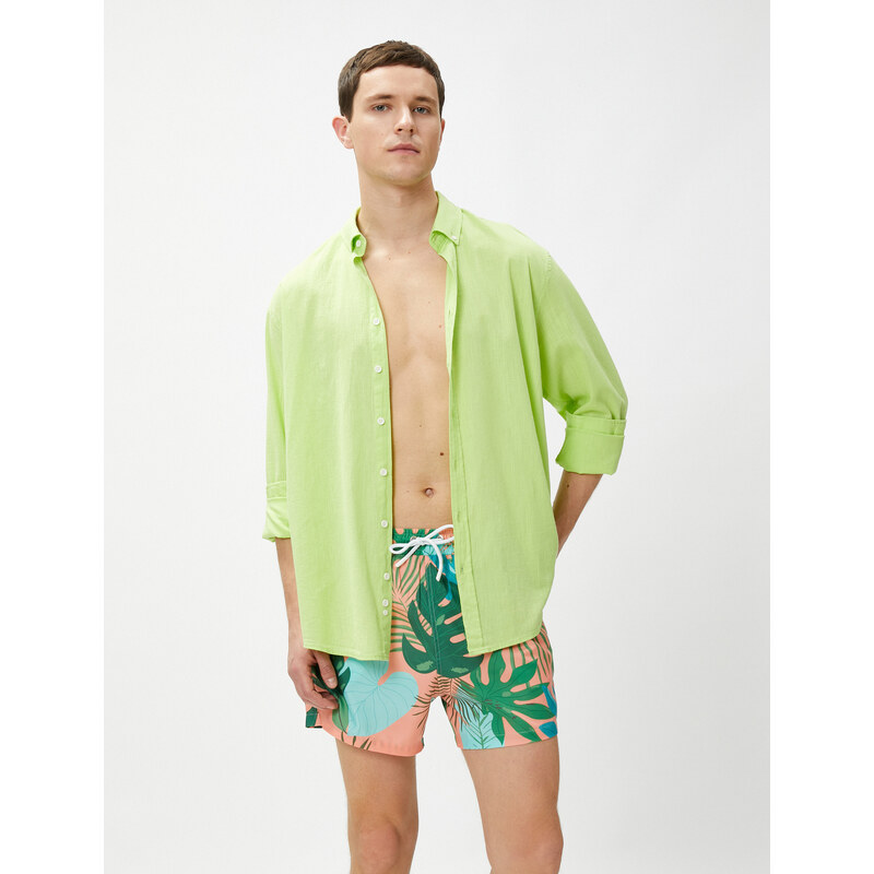 Koton Marine Shorts with a Tropical Print Tie Waist, Pocket Detailed.