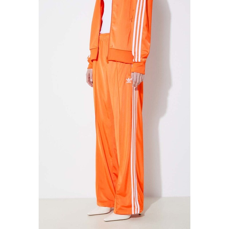 Tepláky adidas Originals oranžová barva, s aplikací, IP0640