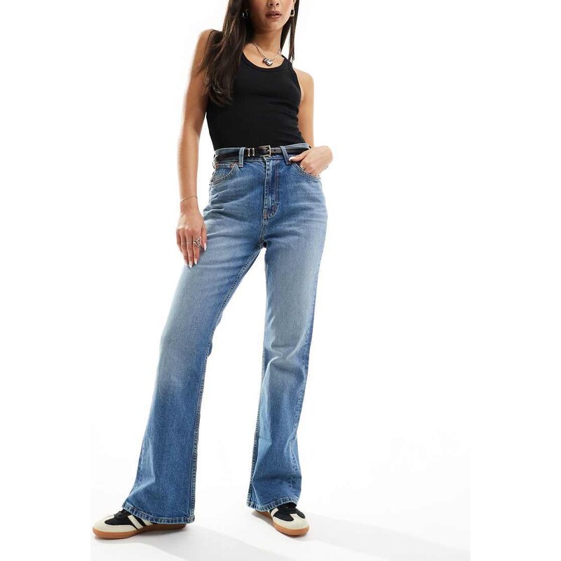 ASOS DESIGN mid rise flare jeans in mid blue 100072375