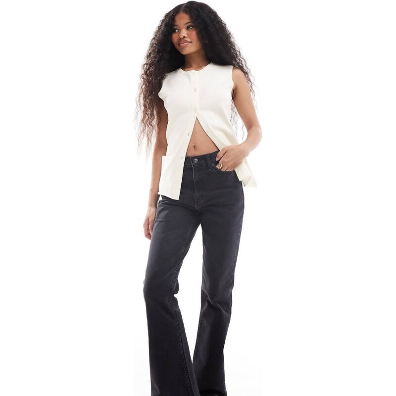 ASOS Petite ASOS DESIGN Petite mid rise flare jeans in washed