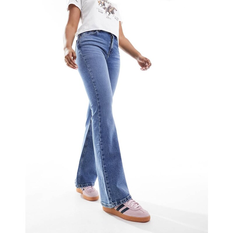 ASOS DESIGN mid rise flare jeans in mid blue