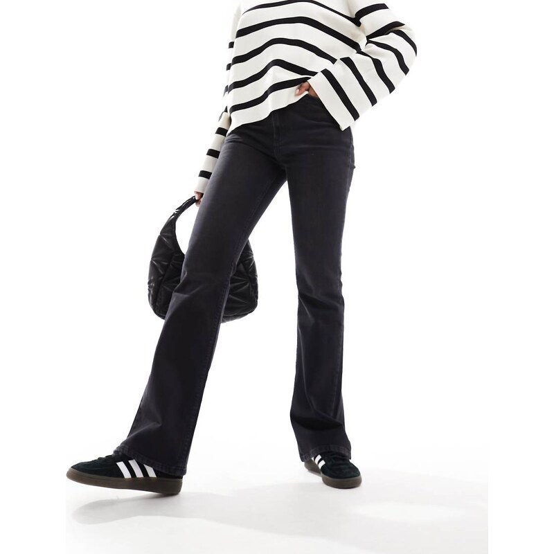 ASOS DESIGN mid rise flare jeans in wash black