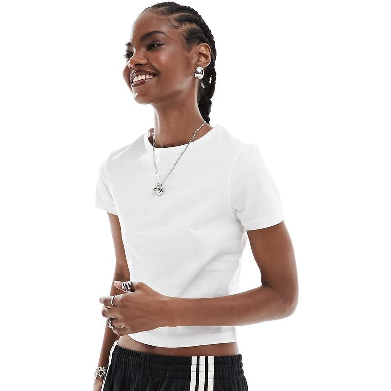COLLUSION baby tee in white