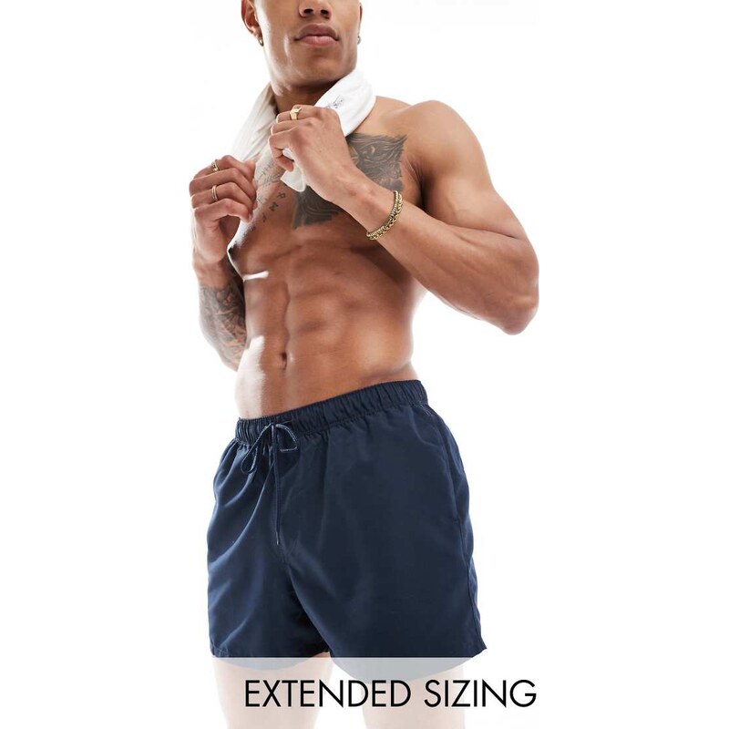 ASOS DESIGN swim shorts in mid length in navy