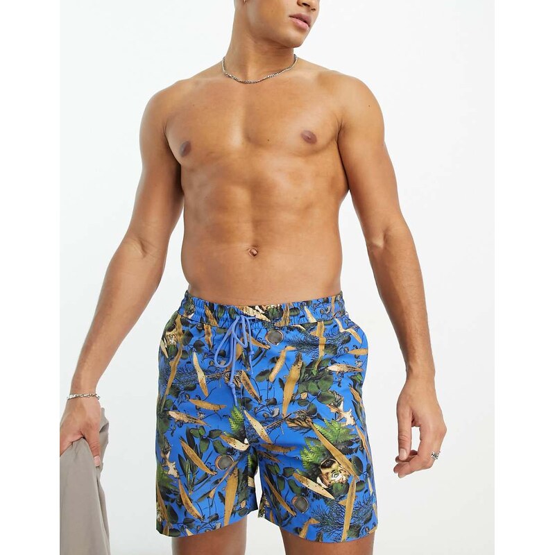 Carhartt WIP slater print swim shorts in blue