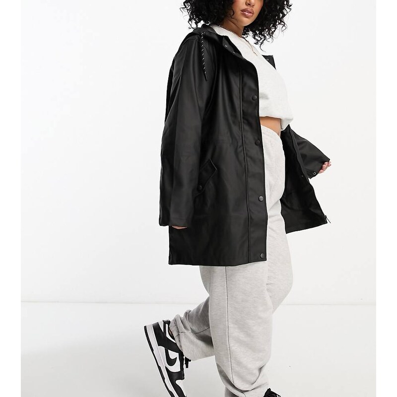Vero Moda Curve rubberised hooded raincoat in black
