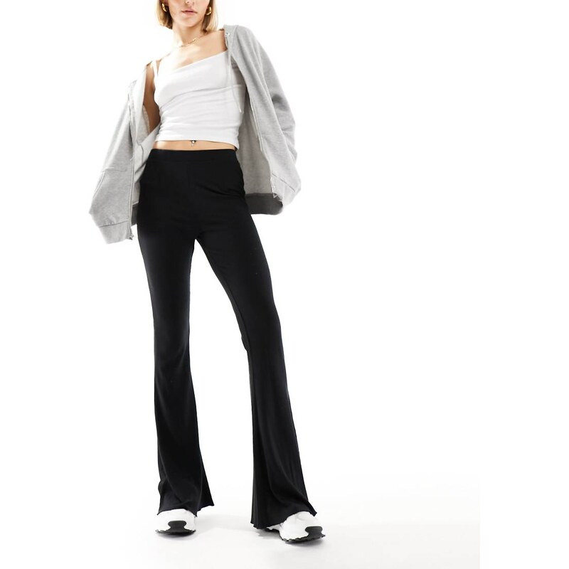 ASOS DESIGN rib flare trouser with lettuce hem in black