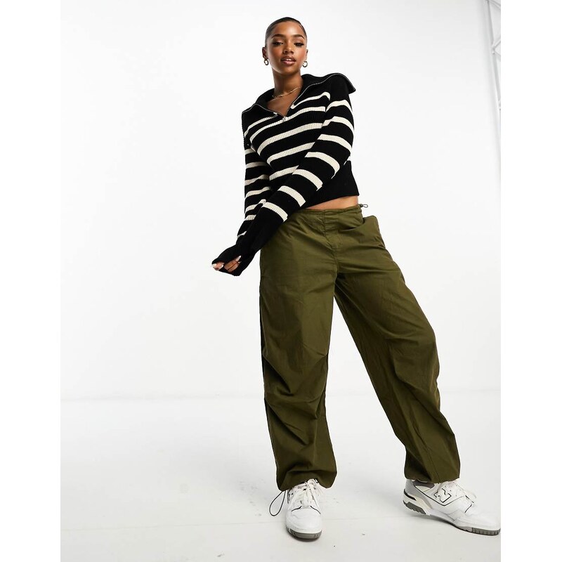 Monki high zip neck knitted jumper in black and white stripe