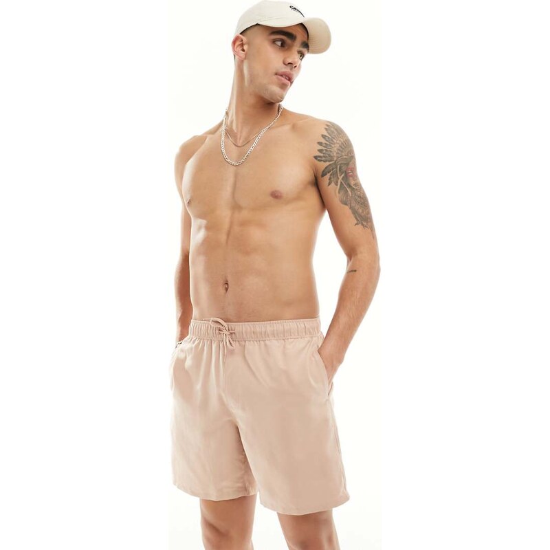 ASOS DESIGN swim shorts in mid length in beige-Neutral