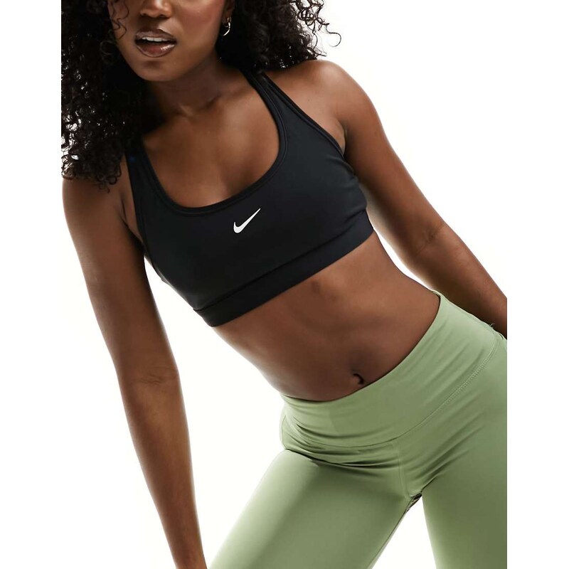 Nike Training Swoosh light support sports bra in black 101629710