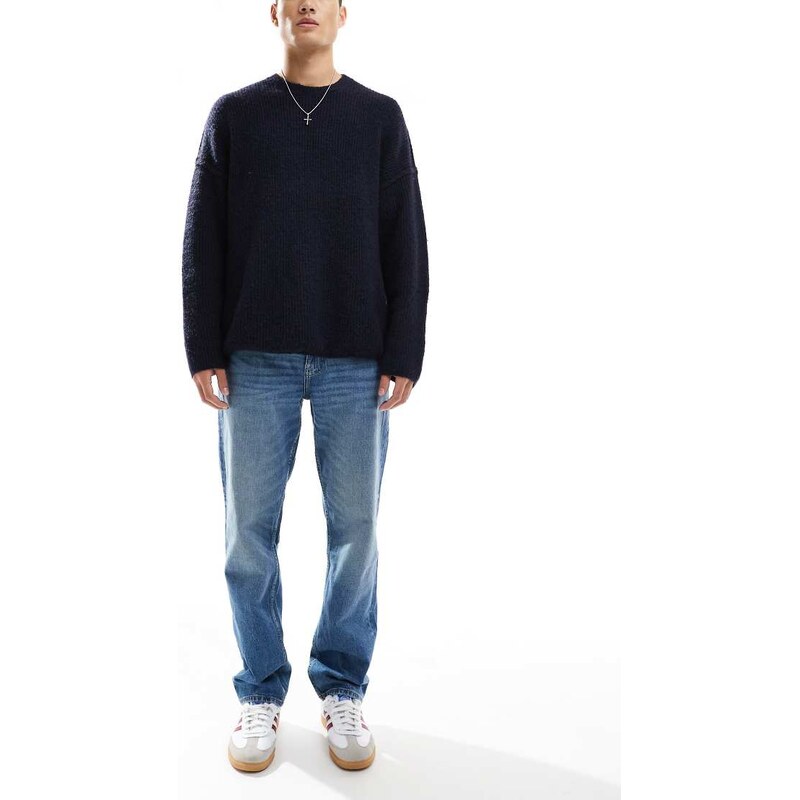 ASOS DESIGN straight leg jeans with stretch in mid wash blue