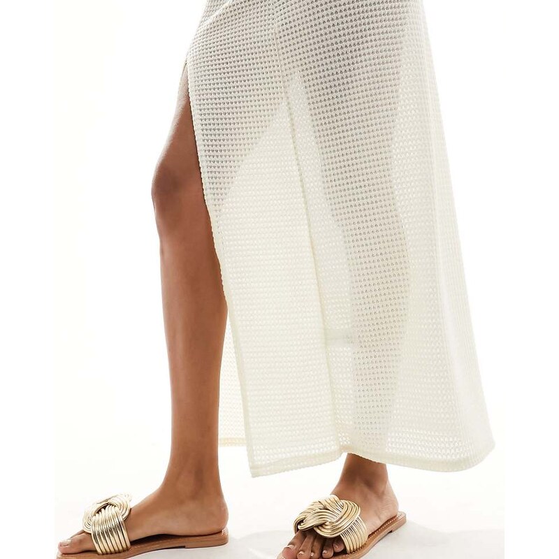 ASOS DESIGN Wide Fit Fifi woven mule flat sandals in gold 113259848