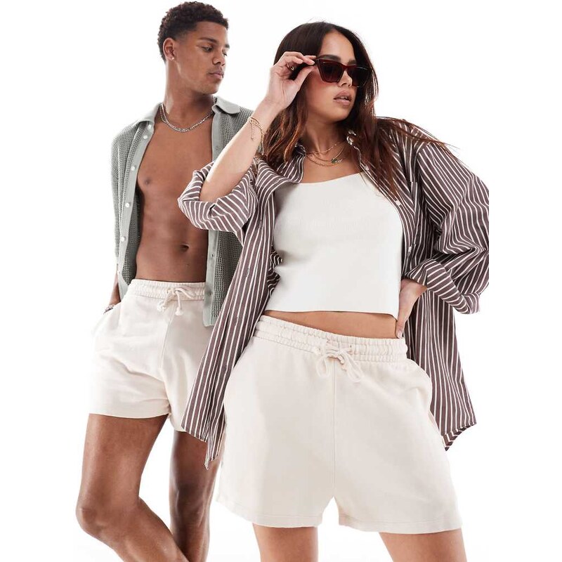 ASOS DESIGN unisex shorter length slim shorts in washed beige-Neutral 100090430
