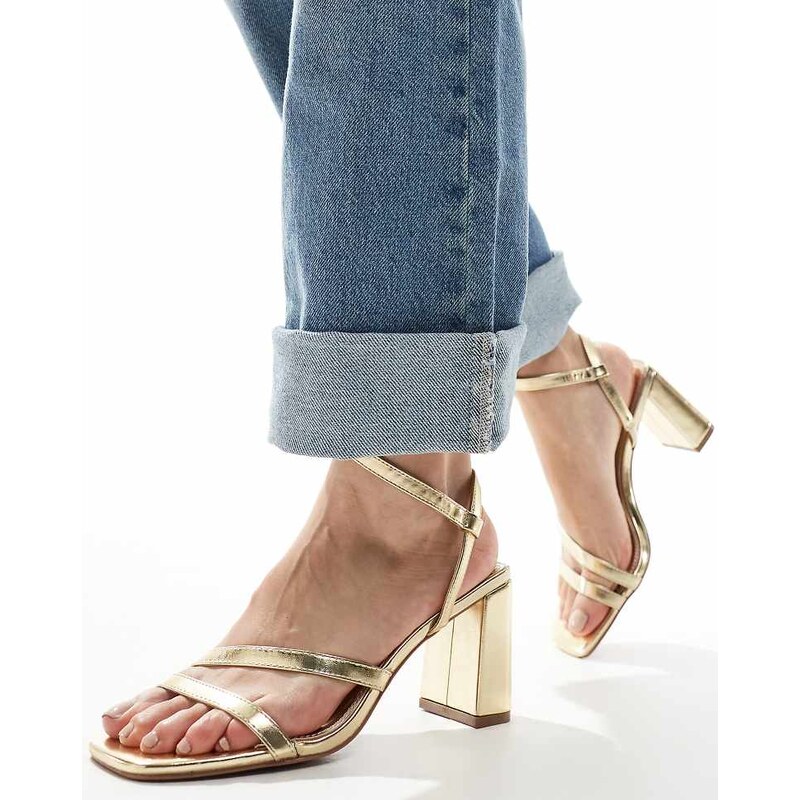 ASOS DESIGN Wide Fit Hampstead mid heeled sandals in gold 101663929