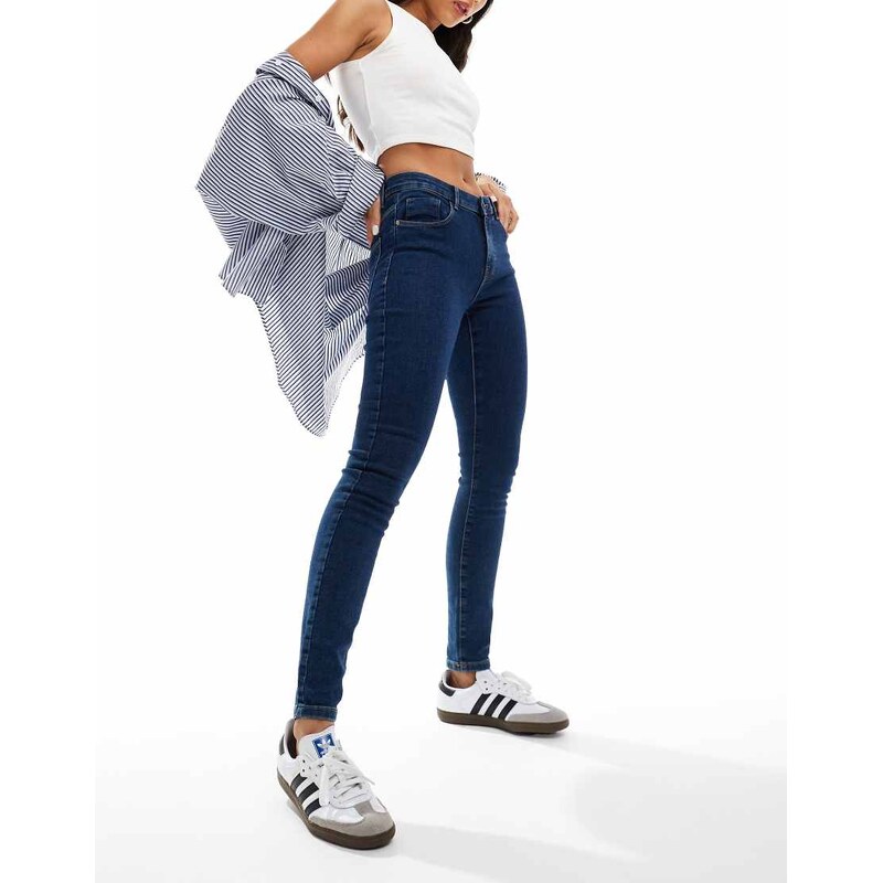 Vero Moda Elly mid rise skinny jeans in dark blue denim