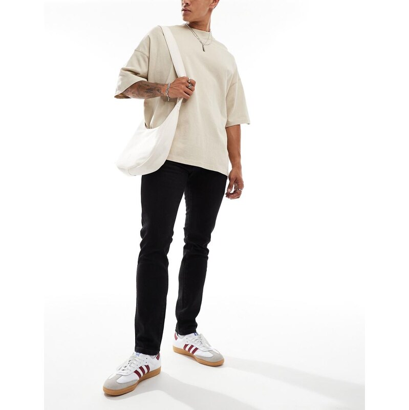 Wrangler Bryson skinny fit jeans in washed black