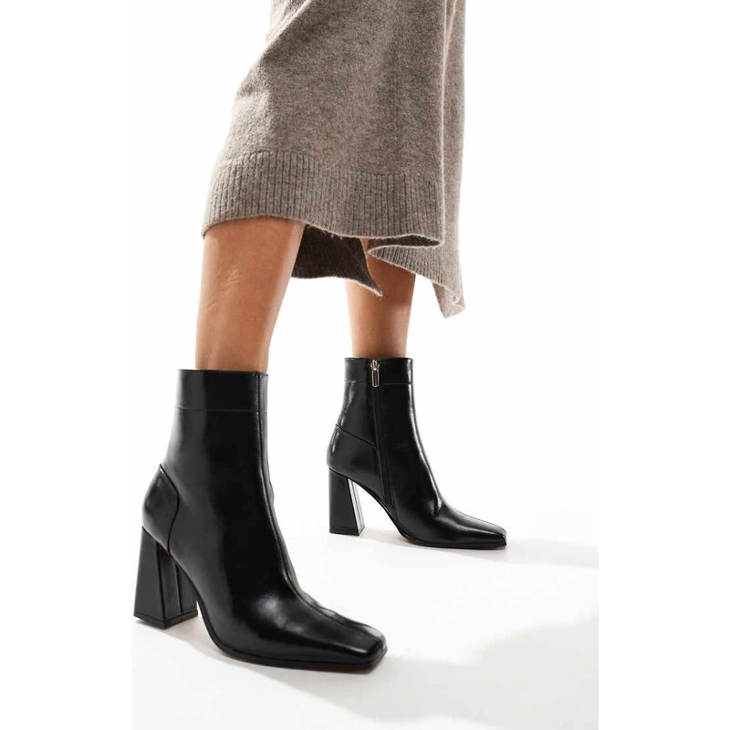ASOS DESIGN Everest flared heel boots in black