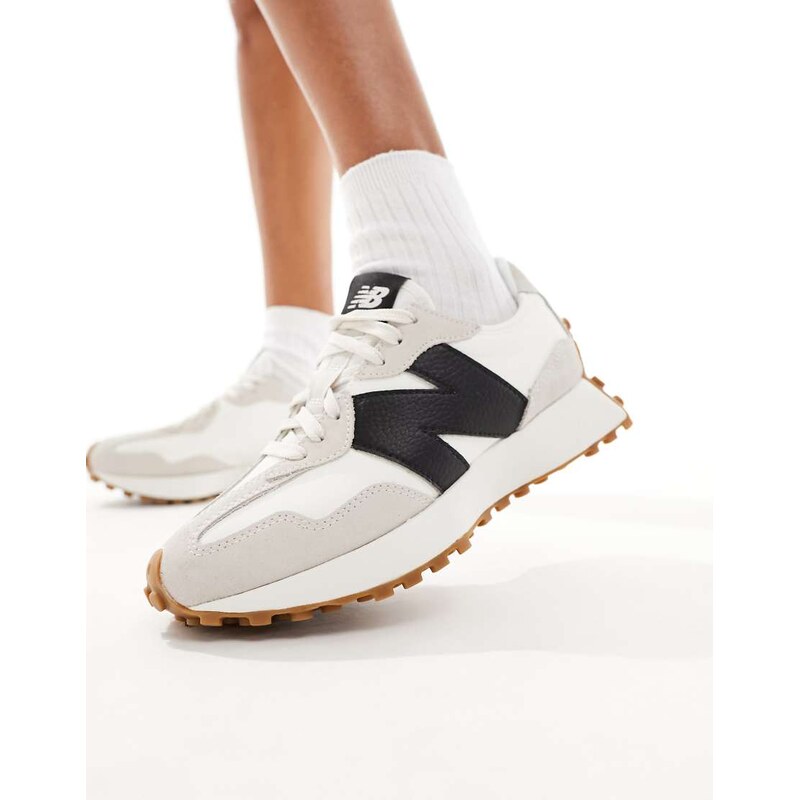 New Balance 327 trainers with gum sole in white and black