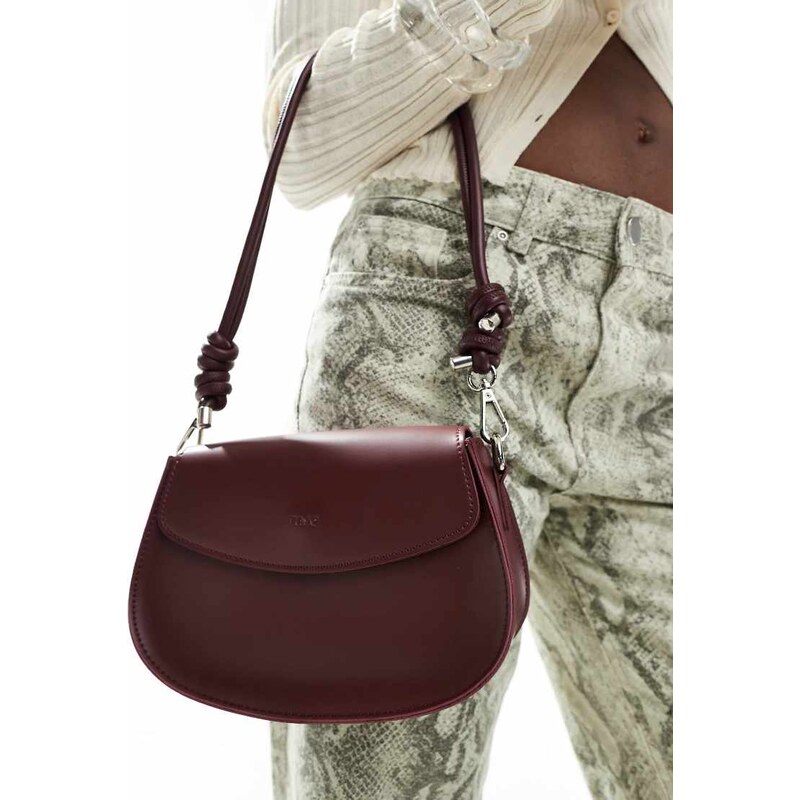 PASQ saddle shoulder bag with knot strap detail in burgundy-Red