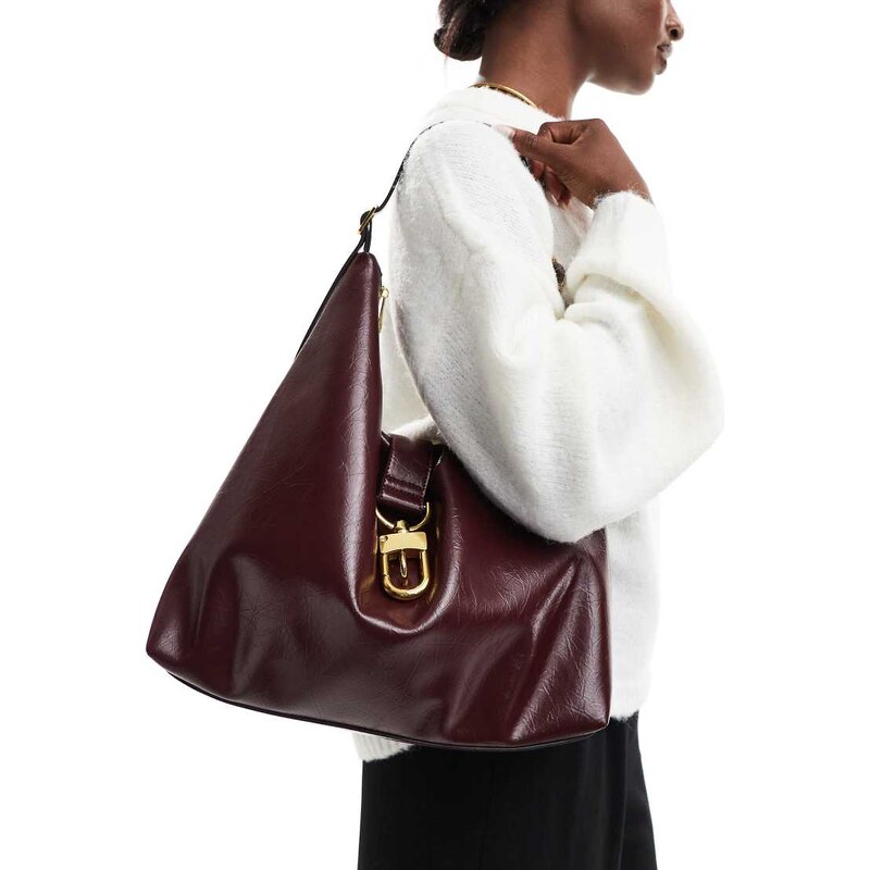ASOS DESIGN statement buckle slouch tote bag in burgundy-Red