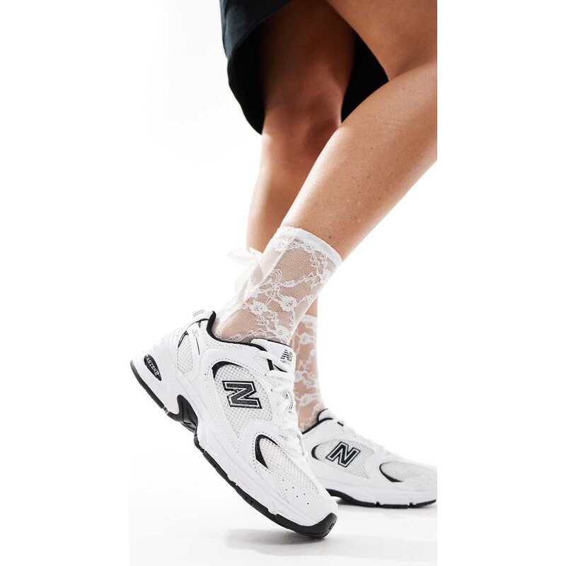 New Balance 530 trainers in white and black