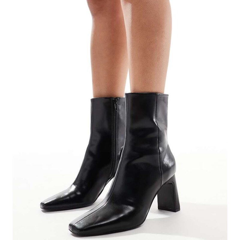 ASOS DESIGN Wide Fit Reach set back mid heel boots in black 115685782